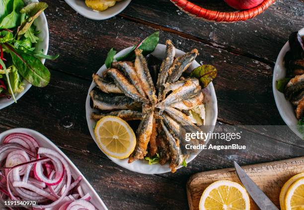 top view fried anchovy - fried stock pictures, royalty-free photos & images