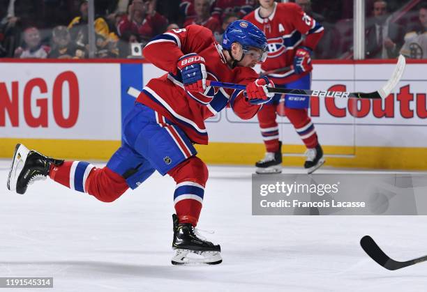 Max Domi of the Montreal Canadiens fires a slap shot against the Boston Bruins in the NHL game at the Bell Centre on November 26, 2019 in Montreal,...