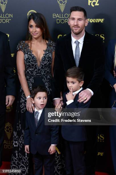 Antonella Roccuzzo and husband Lionel Messi attend the photocall before the Ballon D'Or Ceremony at Theatre Du Chatelet on December 02, 2019 in...