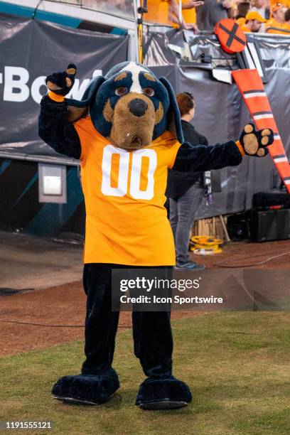 University of Tennessee Volunteers mascot Smokey during the 2019 TaxSlayer Gator Bowl college football game between the Indiana University Hoosiers...