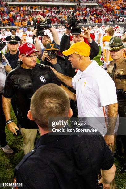 University of Tennessee Volunteers coach Jeremy Pruitt greets the Indiana University Hoosiers coach Tim Allen after Tennessee defeats Indiana during...