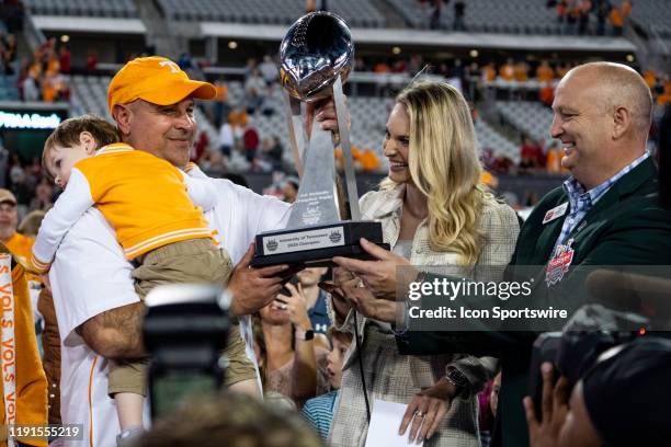 University of Tennessee Volunteers coach Jeremy Pruitt during the trophy ceremony for the 2019 TaxSlayer Gator Bowl college football game between the...