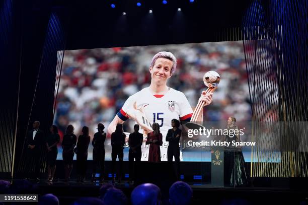 Megan Rapinoe, who was unable to except her award in person, wins the Ballon D'Or award during the Ballon D'Or Ceremony at Theatre Du Chatelet on...