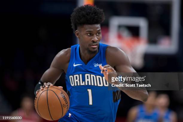 Jonathan Isaac of the Orlando Magic dribbles the ball against the Washington Wizards during the first half at Capital One Arena on January 1, 2020 in...