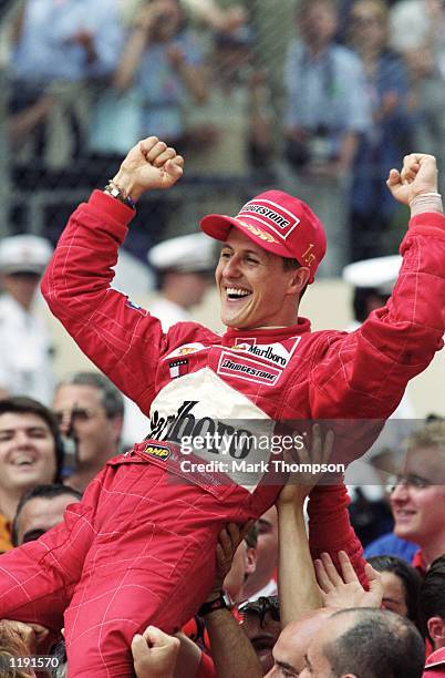 Ferrari driver Michael Schumacher celebrates winning the Formula One Monaco Grand Prix in Monte Carlo, Monaco. \ Mandatory Credit: Mark Thompson...