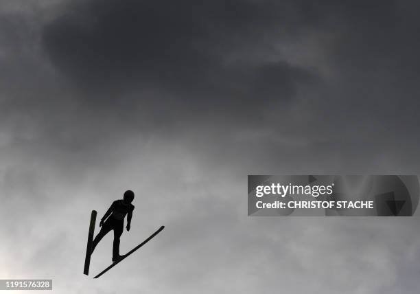 Pius Paschke from Germany soars in the air during his training jump of the Four-Hills Ski Jumping tournament , in Innsbruck, Austria, on January 4,...