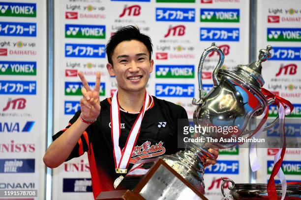 Kento Momota poses at the medal ceremony for the Men's Singles on day six of the 73rd All Japan Badminton Championships at Komazawa Gymnasium on...