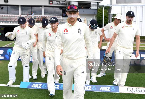 England captain Joe Root leads out his team ahead of day 5 of the second Test match between New Zealand and England at Seddon Park on December 03,...