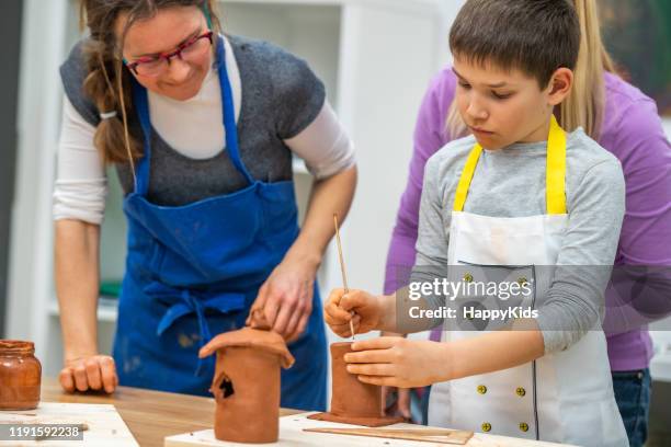 Kid Making Process Happy Kid Making Art Photos and Premium High Res Pictures - Getty Images