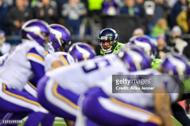 Mychal Kendricks of the Seattle Seahawks, center, reads the Minnesota Vikings offense during the game at CenturyLink Field on December 02, 2019 in...