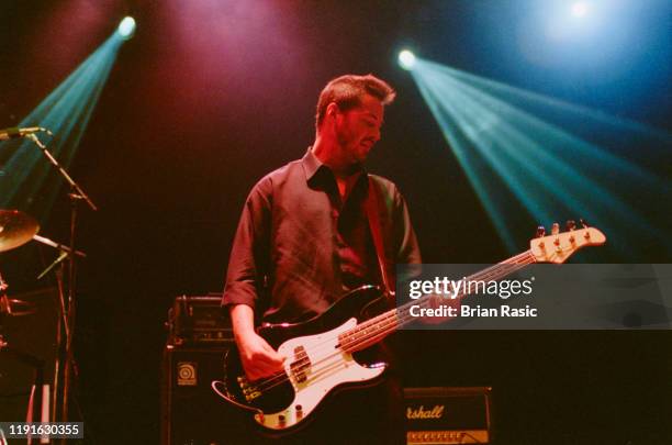 Actor and musician Keanu Reeves plays bass guitar with rock group Dogstar at Shepherd's Bush Empire in London on 16th July 1996.