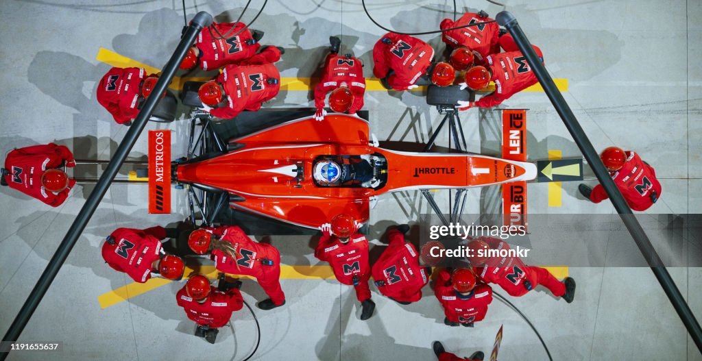 Pit crew working at pit stop