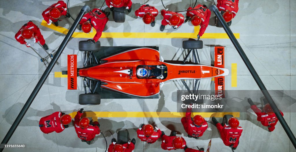 Pit crew working at pit stop