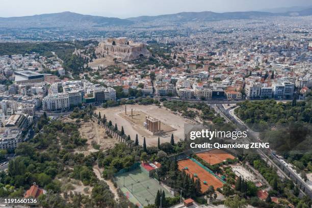 aerial drone shot of northern side of acropoli, filopappou hill, olympion zeus temple - ancient olympia greece stock pictures, royalty-free photos & images