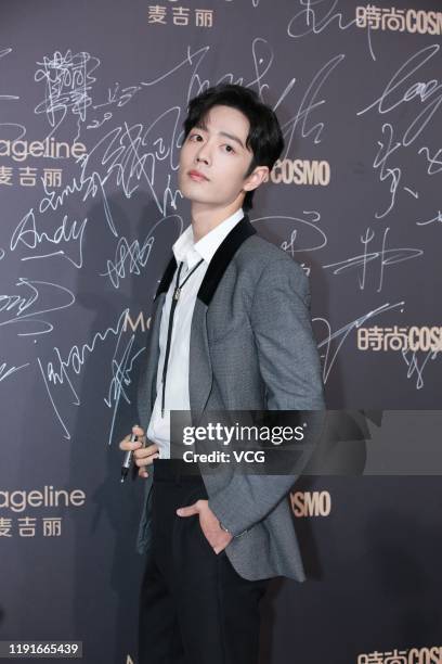 Actor Xiao Zhan arrives at the red carpet of 2019 COSMO Glam Night on December 3, 2019 in Shanghai, China.