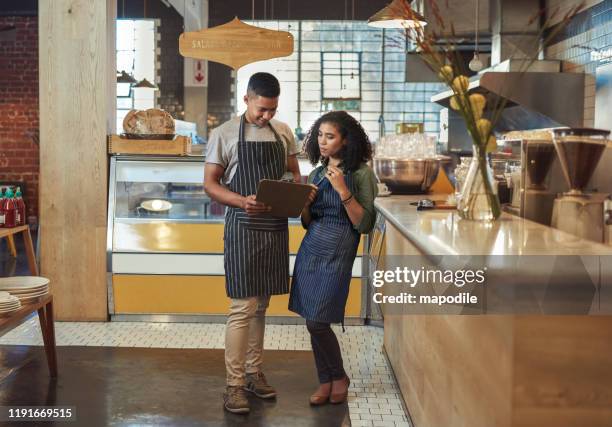 managing it all as business partners - restaurant staff stock pictures, royalty-free photos & images