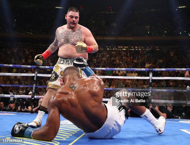 Andy Ruiz Jr knocks down Anthony Joshua in the third round during their IBF/WBA/WBO heavyweight title fight at Madison Square Garden on June 01, 2019...