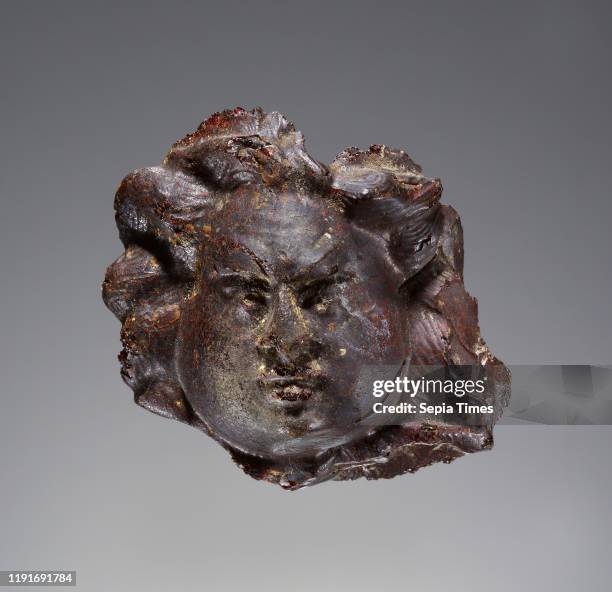 Gorgoneion , Italy , 1st - 2nd century, Amber, 5.8 _ 5.8 _ 3.2 cm
