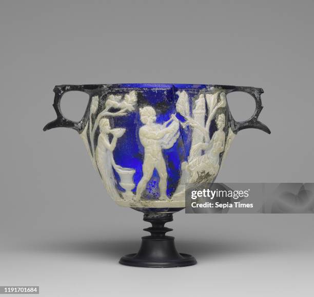 Wine Cup with Scenes of Bacchus and His Consort, Ariadne; Roman Empire; 25 B.C. - A.D. 25; Glass; 10.5 _ 17.6 _ 10.6 cm