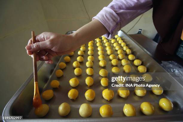 Workers make cookies at the De Liza cake shop, Cibinong, Bogor Regency, on May 21, 2019. According to business people, the demand for pastries sold...