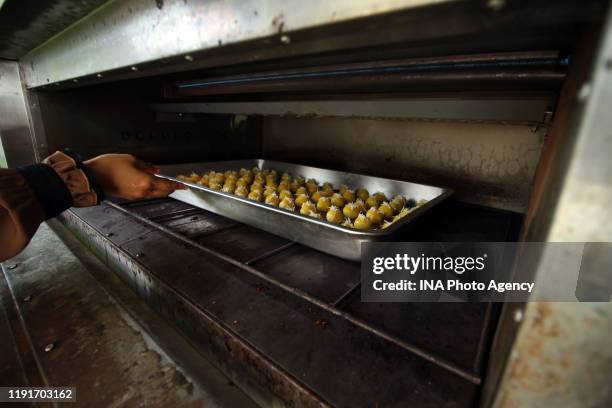 Workers make cookies at the De Liza cake shop, Cibinong, Bogor Regency, on May 21, 2019. According to business people, the demand for pastries sold...