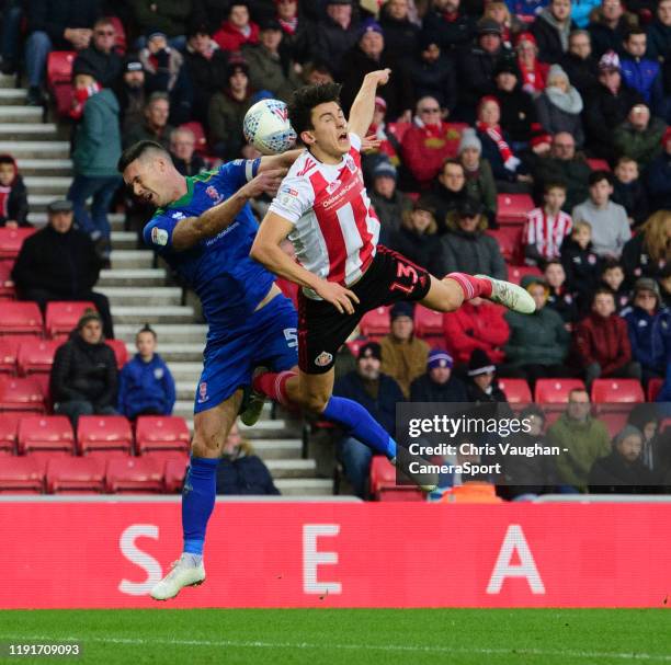 Sunderland's Luke O'Nien is fouled by Lincoln City's Jason Shackell during the Sky Bet League One match between Sunderland and Lincoln City at...