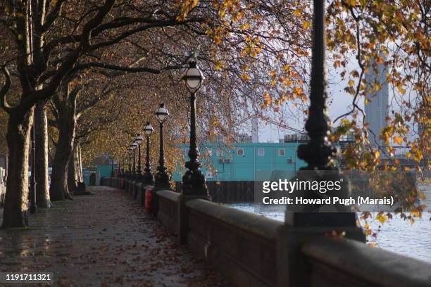 sunny autumn embankment morning - howard street stock pictures, royalty-free photos & images