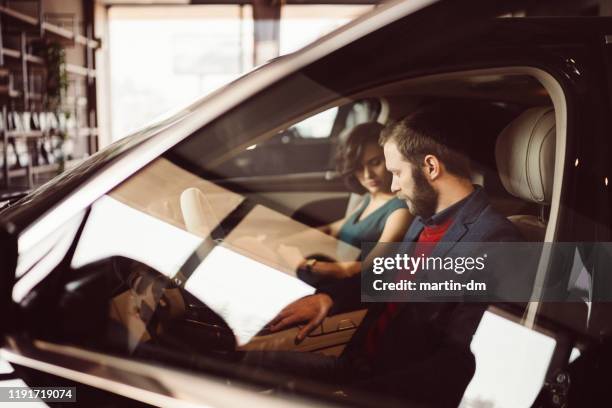 couple testing new car - new husband stock pictures, royalty-free photos & images