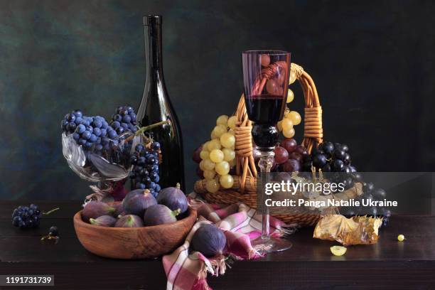 grapes, figs and red wine - wine basket stock pictures, royalty-free photos & images