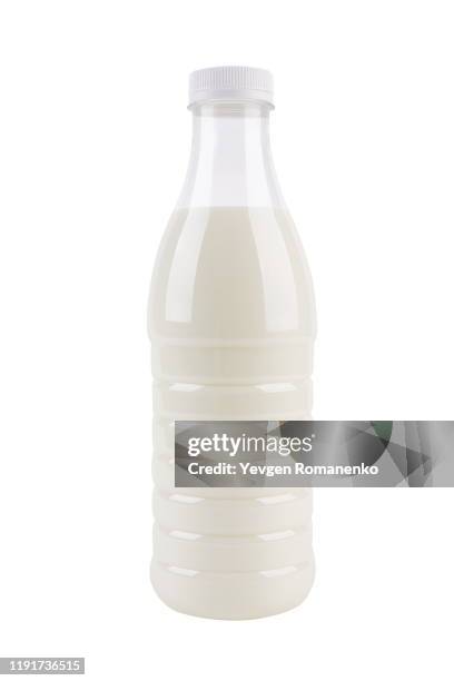 bottle of fresh milk in a plastic bottle isolated on a white background - yoghurt lid stock pictures, royalty-free photos & images