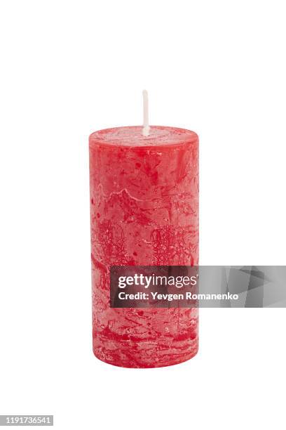 red candle isolated on white background - wachs stock-fotos und bilder