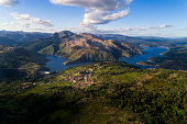 Aerial panoramic view of the historic village of Lindoso, with the surroundings mountains and lake, at the Peneda Geres National Park