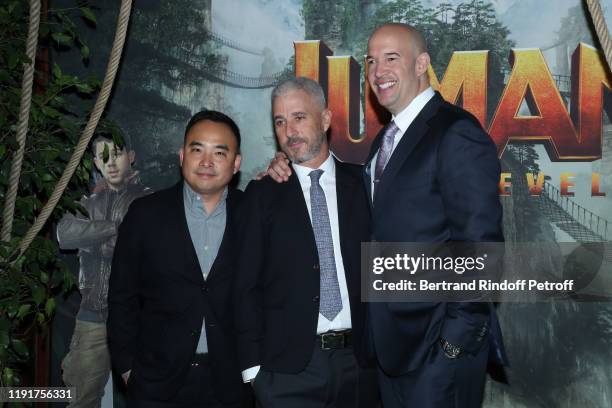 Producers of the movie : Melvin Mar, Matt Tolmach and Hiram Garcia attend the photocall of the "Jumanji : Next Level" film at le Grand Rex on...