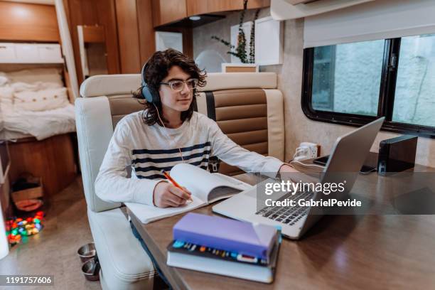 teenager doing homework on motor home - trailer home stock pictures, royalty-free photos & images