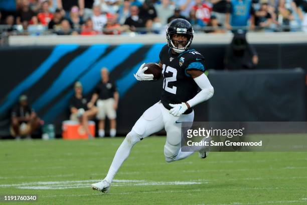 Dede Westbrook of the Jacksonville Jaguars runs for yardage during the game against the Tampa Bay Buccaneers at TIAA Bank Field on December 01, 2019...