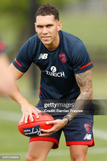 Harley Bennell completes some handball drills during a Melbourne Demons AFL training session at Gosch's Paddock on December 04, 2019 in Melbourne,...