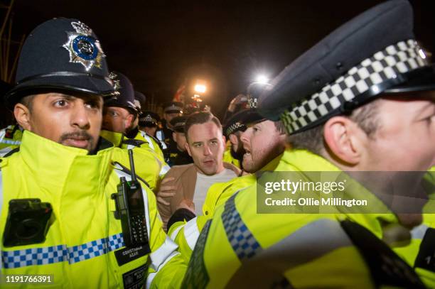 Danny Thomas, who brands himself Danny Tommo, a British Right Wing agitator affiliated with Tommy Robinson, is removed by a large number of the...