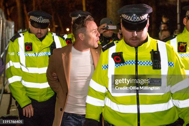 Danny Thomas, who brands himself Danny Tommo, a British Right Wing agitator affiliated with Tommy Robinson, is removed by a large number of the...