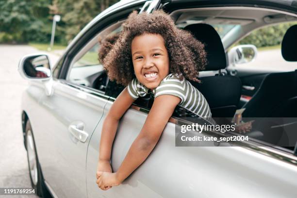 holidays by the car - looks of the week imagens e fotografias de stock