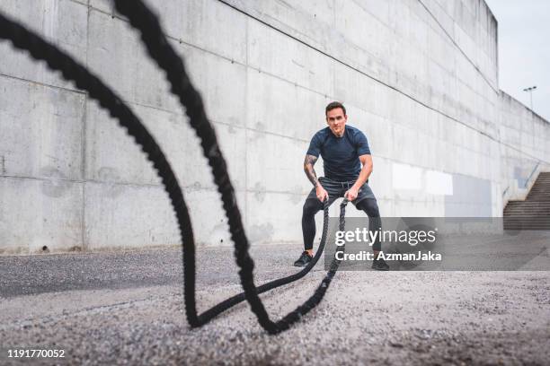 Using Battle Ropes Outside 521 Battle Ropes Outdoors Stock Photos, High-Res Pictures, and Images ...