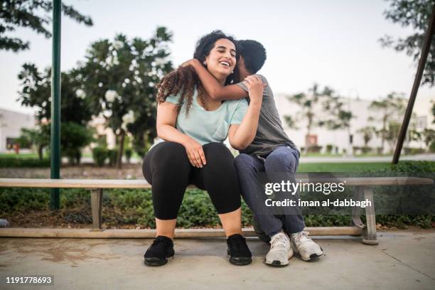 portrait of a middle-easteron woman in saudi arabia - supermom ストックフォトと画像