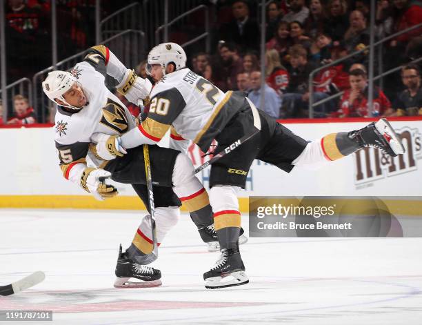 Chandler Stephenson of the Vegas Golden Knights collides with Ryan Reaves during the third period against the New Jersey Devils at the Prudential...