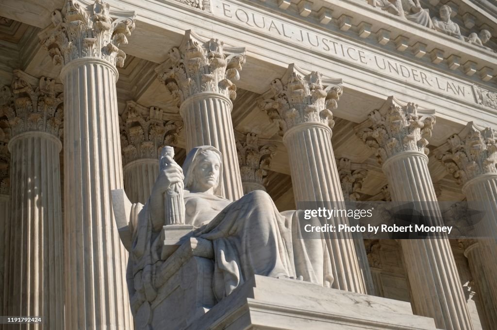 U.S. Supreme Court Building: Statue of Contemplation of Justice and Inscription "Equal Justice Under Law" at Main West Entrance
