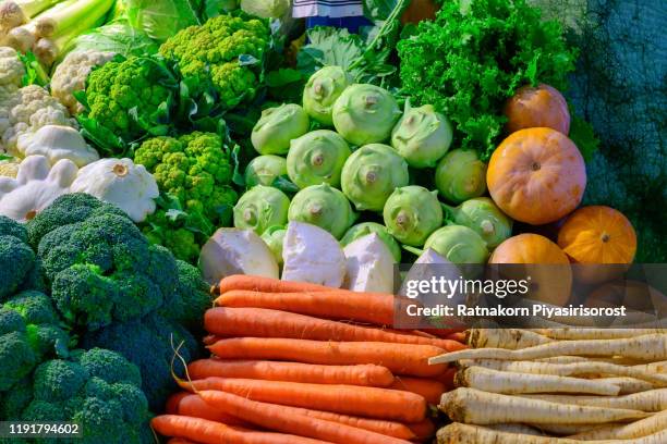 organic vegetable and fruit aisle in grocery store - carrot stock photos et images de collection