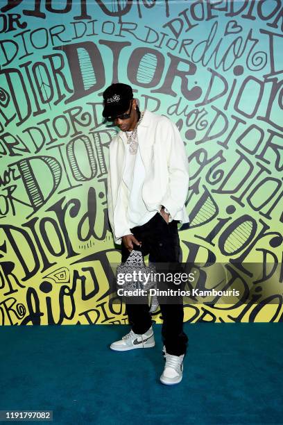 Travis Scott attends the Dior Men's Fall 2020 Runway Show on December 03, 2019 in Miami, Florida.