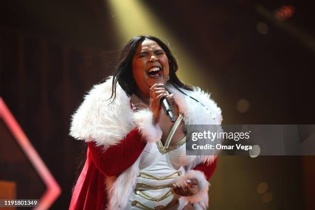 Lizzo performs on stage during 106.1 KISS FM's iHeartRadio Jingle Ball 2019 at Dickies Arena on December 3, 2019 in Dallas, Texas.