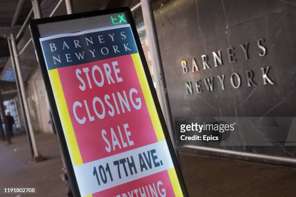 Sandwich board sign advertising Barneys closing down sale is seen outside their store in Manhattan, New York City - the stores will be closing after...