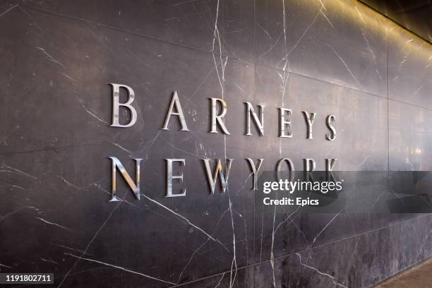 The sign for the famed Barneys fashion and department store is seen in Manhattan, New York City, the stores will be closing after Barneys announced...