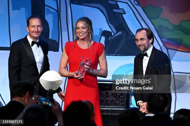 Ewout Steenbergen, Marjolein Steenbergen, and Prince Zeid Ra'ad Al Hussein pose on stage at the 15th Annual UNICEF Snowflake Ball 2019 at Cipriani...