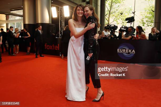 Tess Haubrich and Ksenija Lukich attend the 2019 AACTA Awards Presented by Foxtel at The Star on December 04, 2019 in Sydney, Australia.